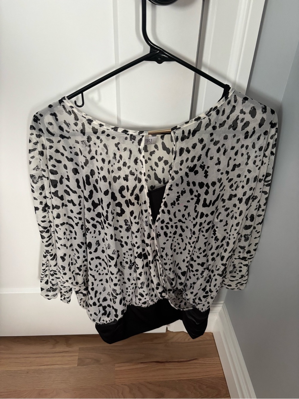 Jennifer Lopez Black and White Leopard Print V-Neck Blouse